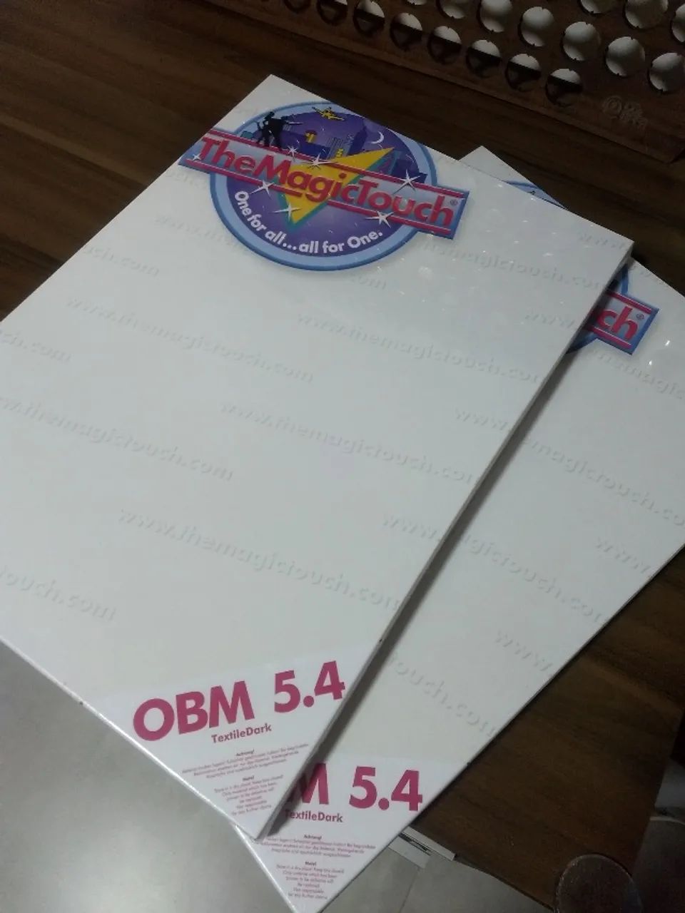 Transfer OBM 5.4 A3 TMT - impressora laser / tecidos coloridos - 2 cx. com 50 folhas cada