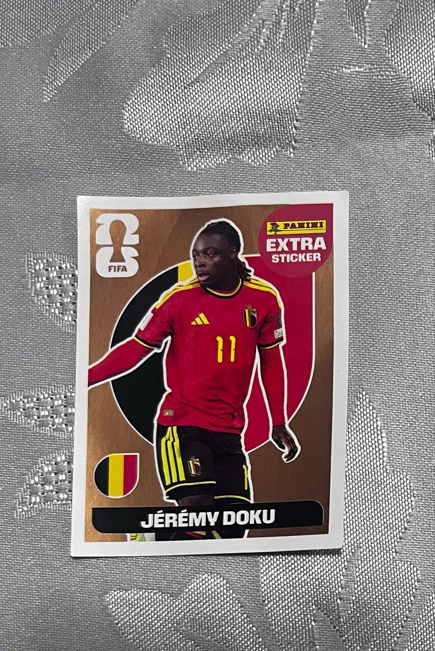 Figurinha extra sticker Jéremy Doku bronze