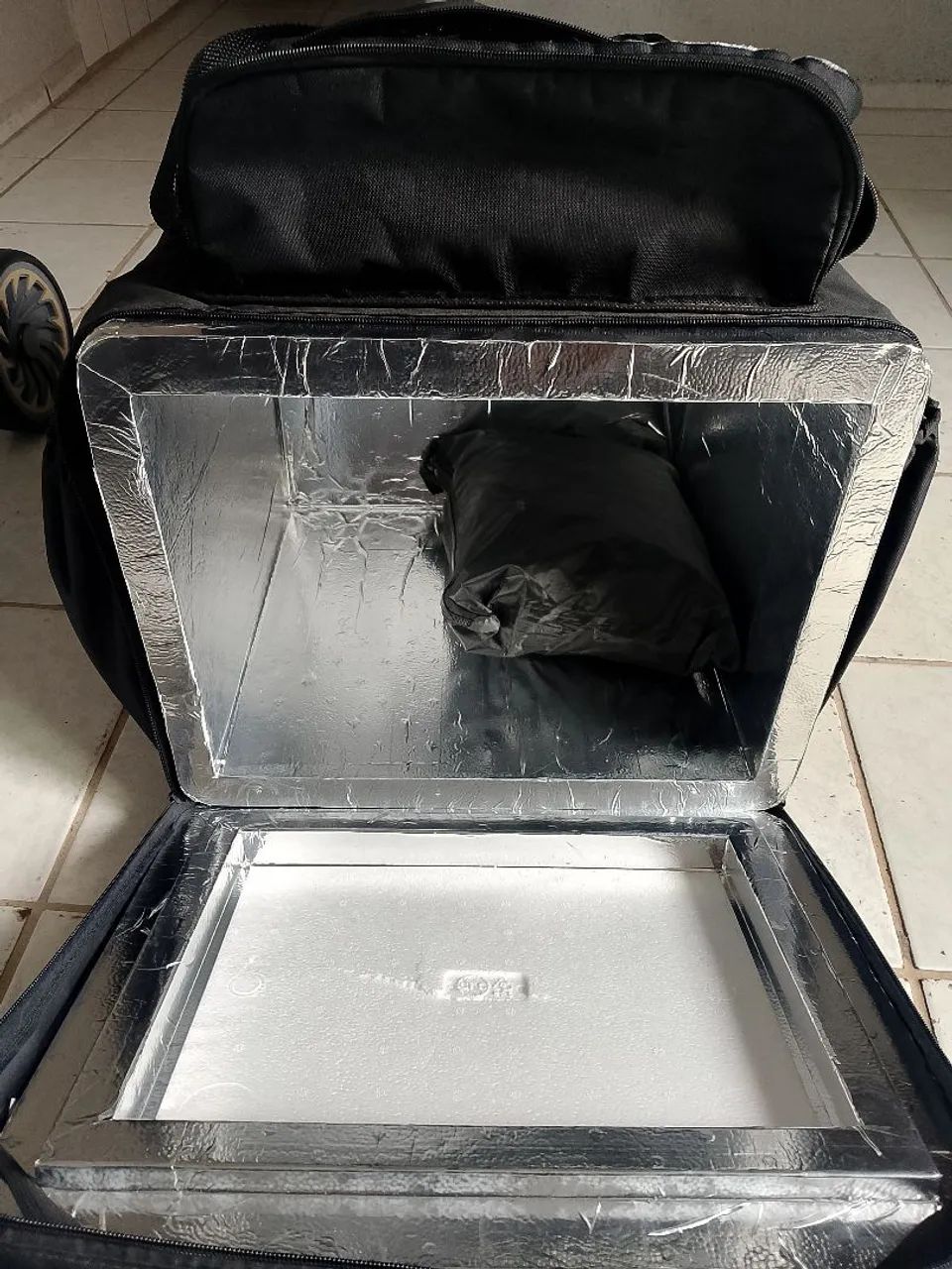 Kit capa de chuva e bag