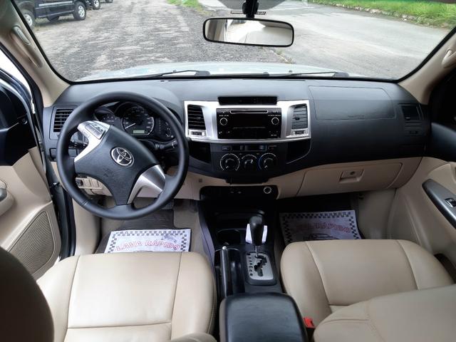 Toyota hilux sw4 sr top flex com gnv ano 2014 - Foto 10