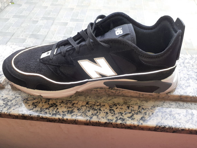 tenis nike parecido com new balance