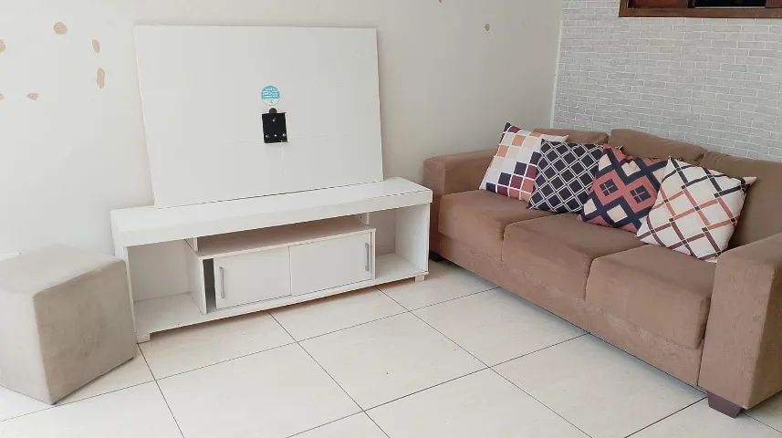 Sofa retratil + rack c/painel + pufe