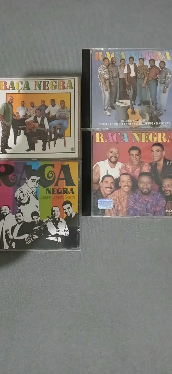 CDs originais raça negra e só pra contrariar