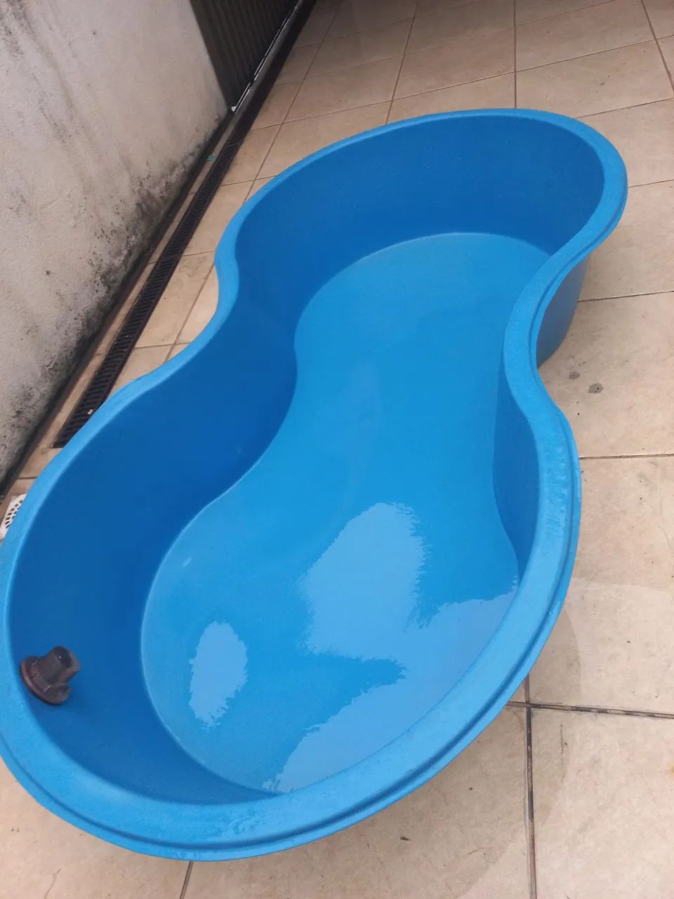 Piscina em formato feijão 64305627876354122