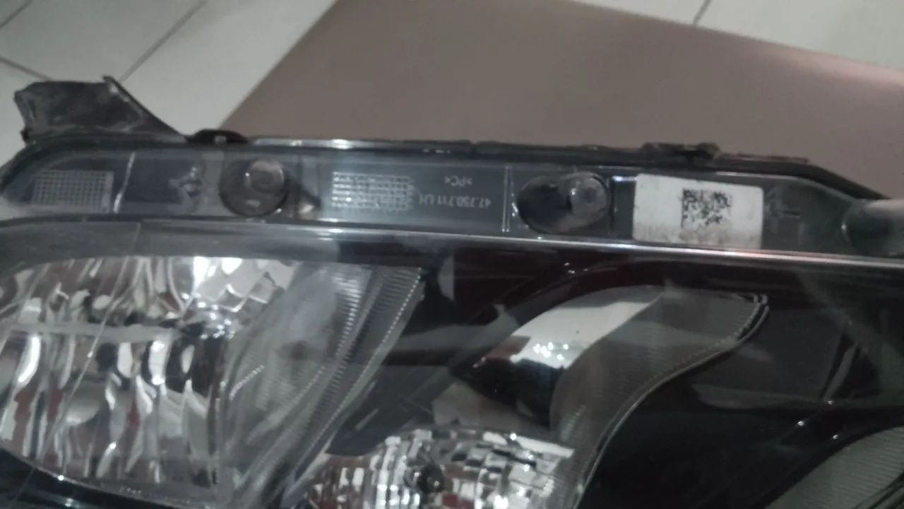 Farol esquerdo Sandero Logan Original  - Foto 4