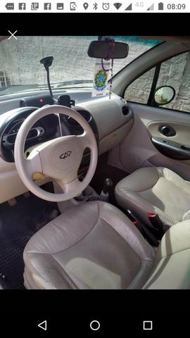 Chery QQ3 1.1 2012 completo banco de couro ar, ótimo pra Uber!! - Foto 3