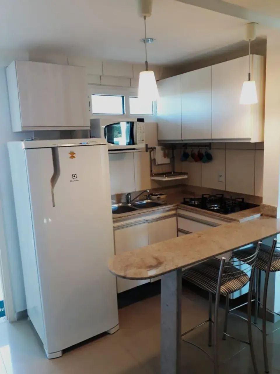 Excelente flat em ponta negra