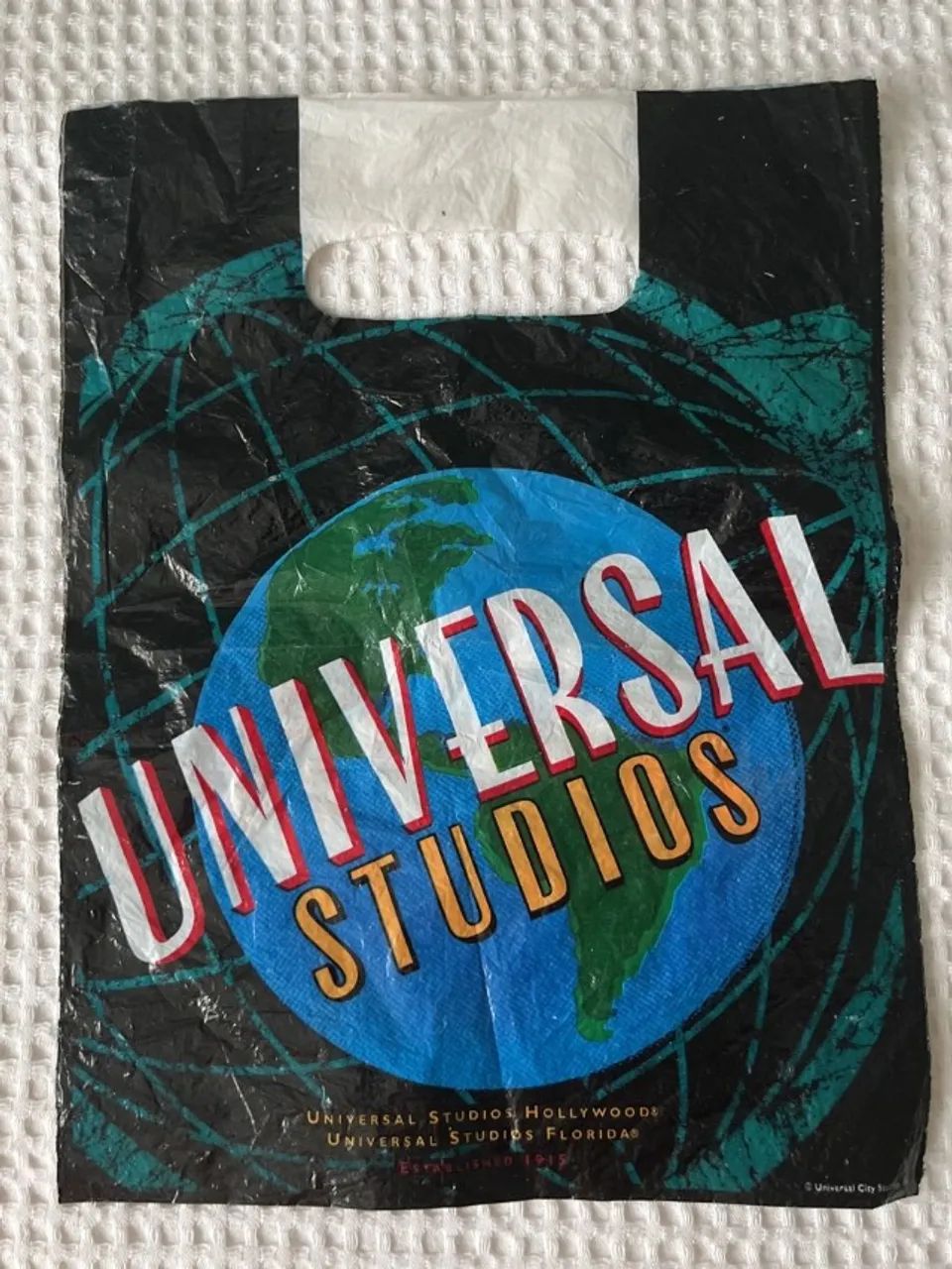 embalagem sacola universal studios preta
