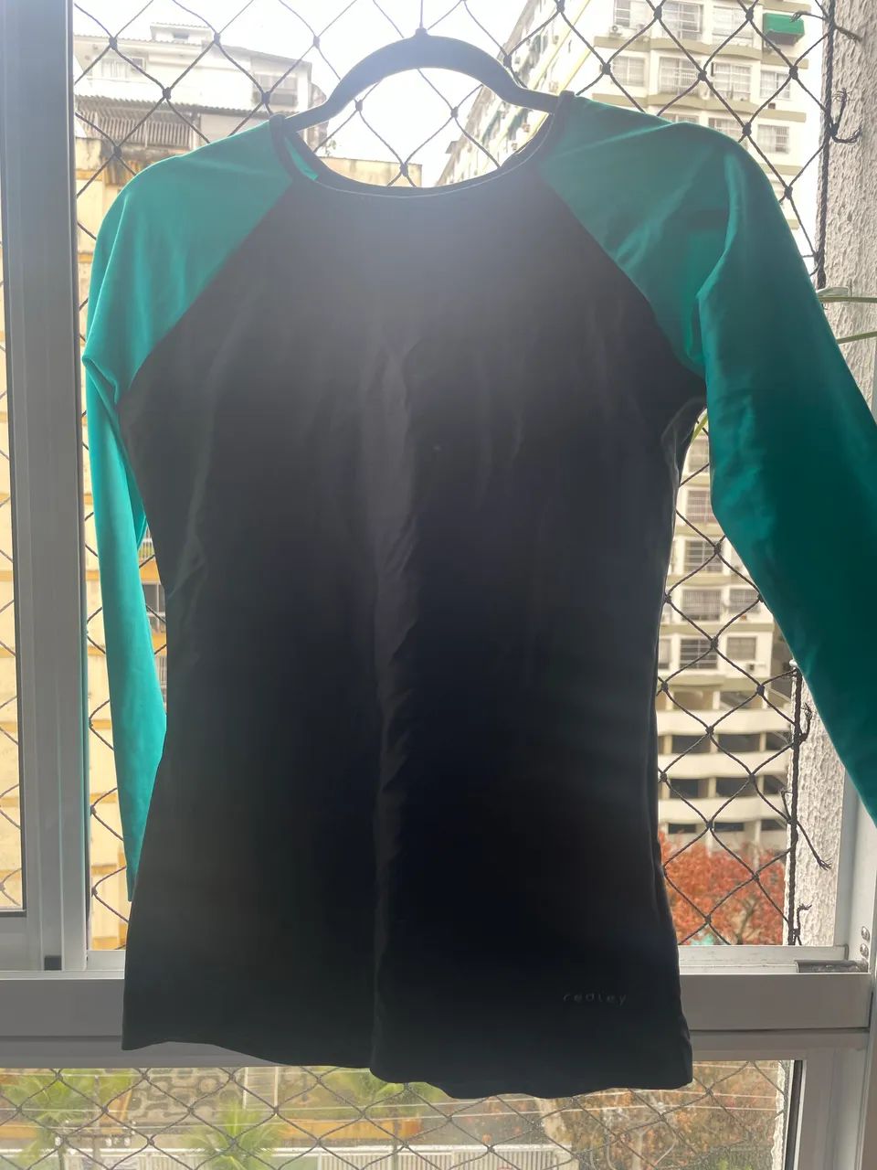 Blusa de surfista