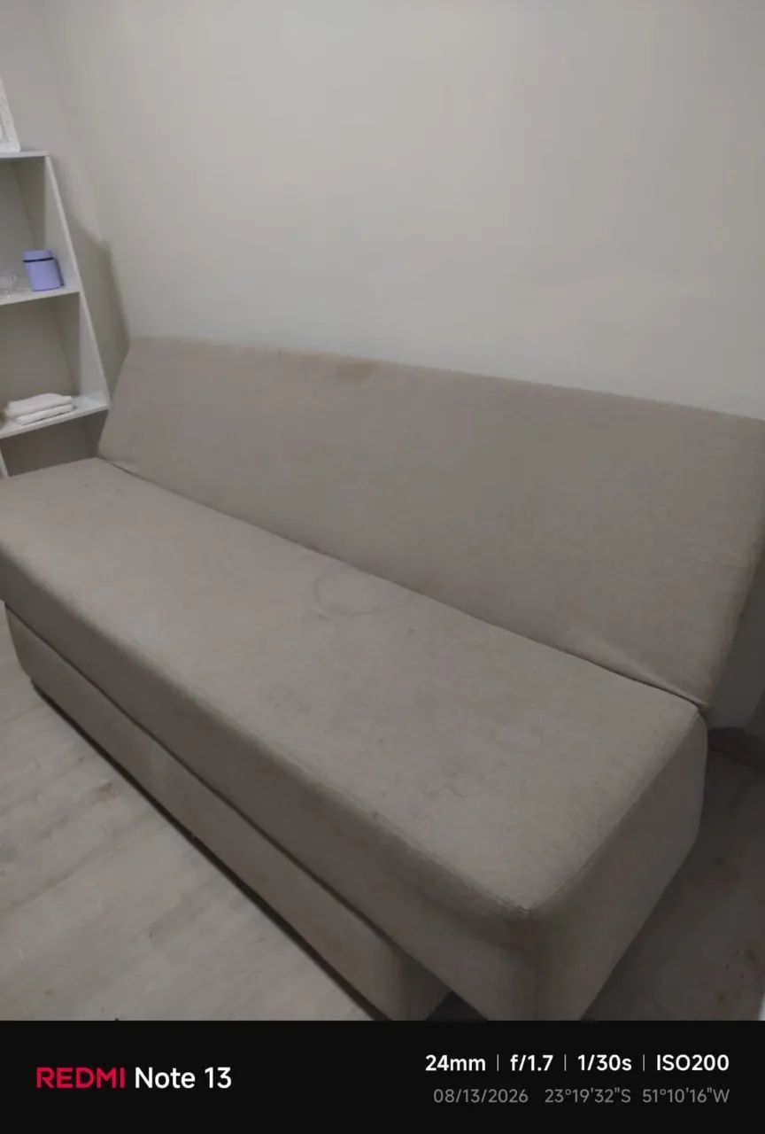 Sofá-cama bege em bom estado 