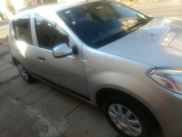 Sandero 12 1.6 8v flex com gnv - Foto 5