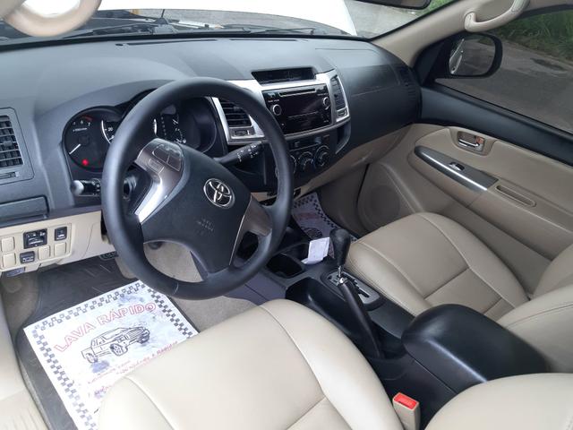 Toyota hilux sw4 sr top flex com gnv ano 2014 - Foto 12