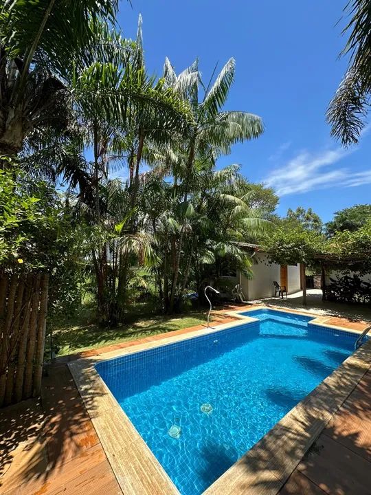 Vendo Chácara com piscina e área verde em condomínio fechado