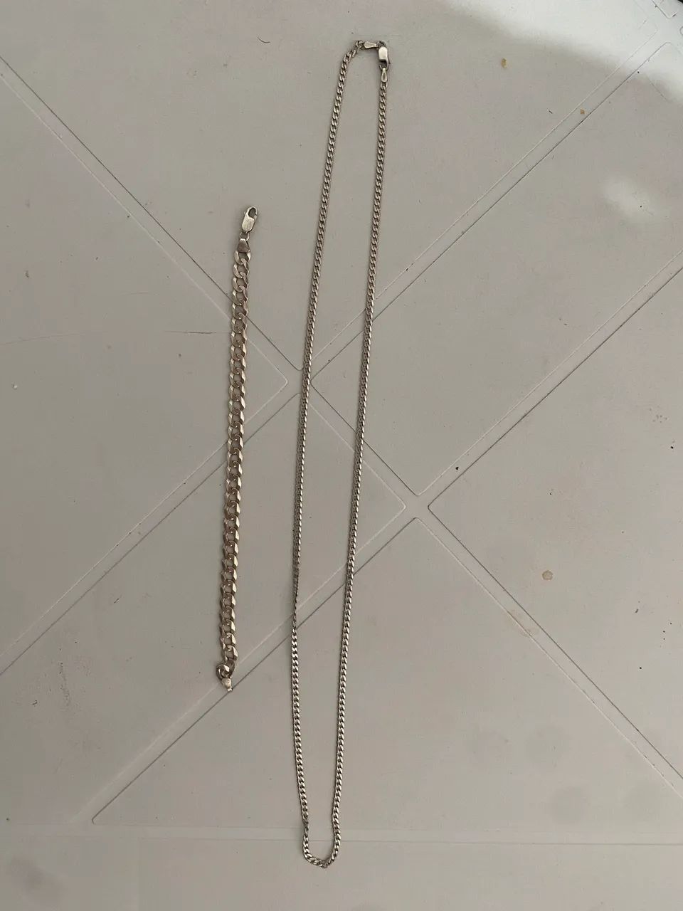 Corrente e pulseira de prata