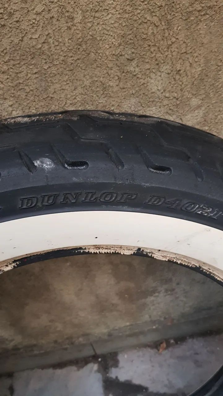 Pneu marca harley davidson faixa branca para usado meia vida aro 16 traseiro é dianteiro 
