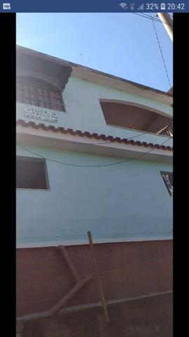 Vendo casa com quitinete junto e um terreno nos fundos 70mil - Foto 2
