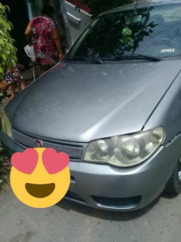 Vendo ou troco por um carro de menos valor com volta pra mim