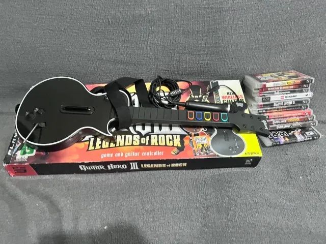 Guitarra Les Paul Guitar Hero III - PS3 na caixa mais microfone e lote de jogos musicais