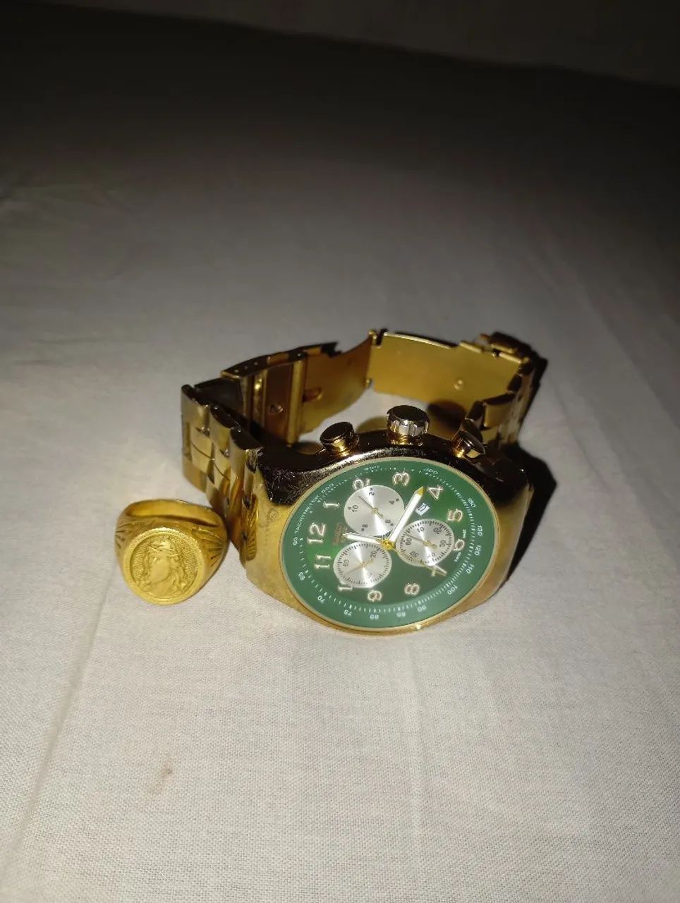 Vendo Swatch cara verde junto com uma dedeira 