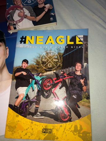 NEAGLE- Livro+pôster+pulseira+Livrão interativo - Foto 4