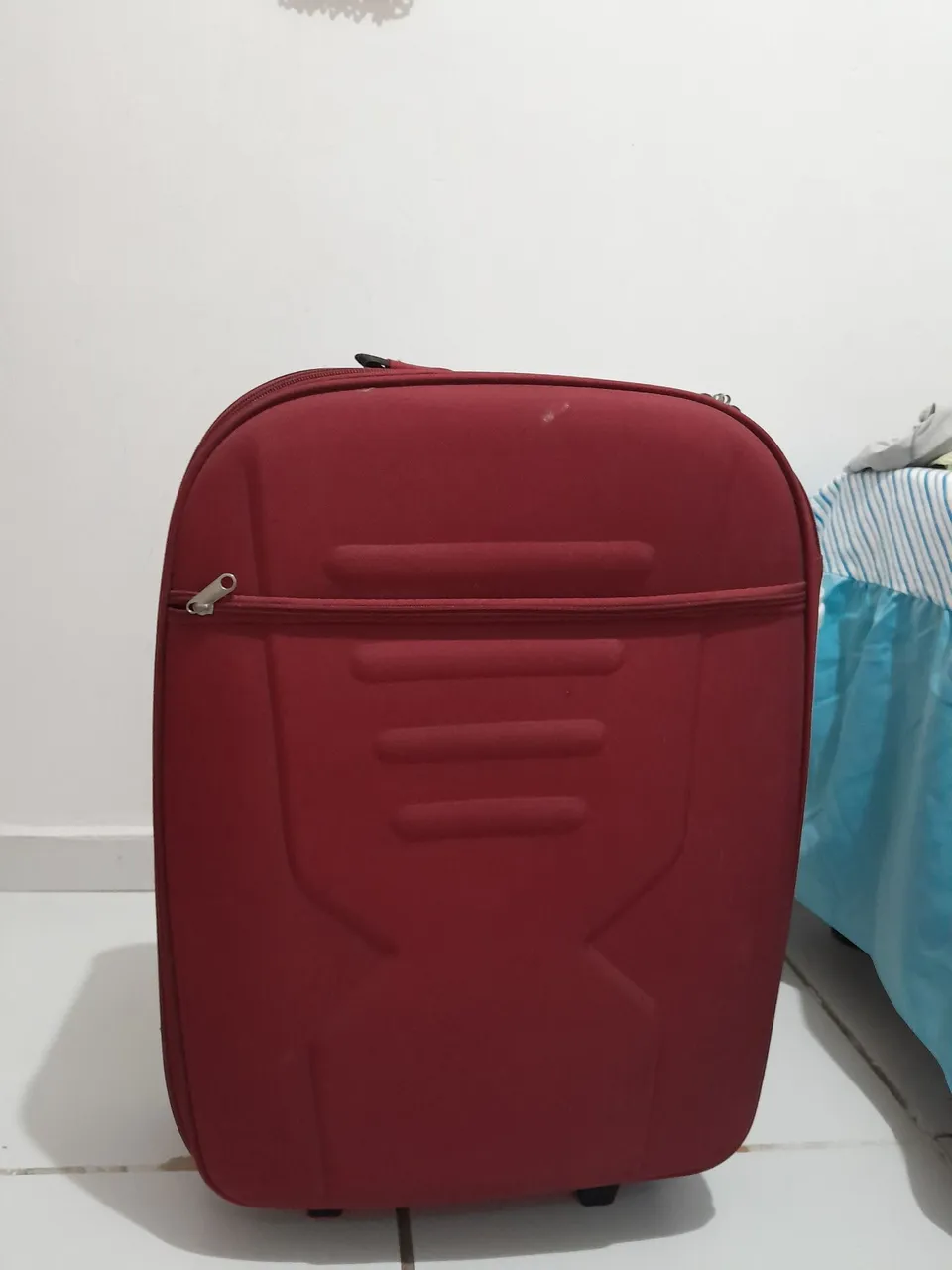 Mala de viagem vermelha