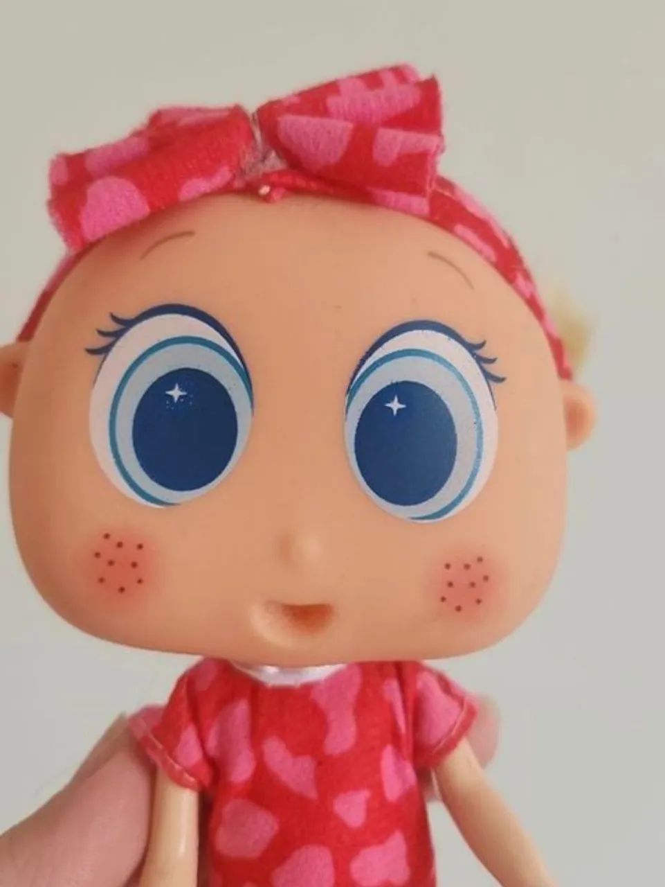 boneca loira olhos azul