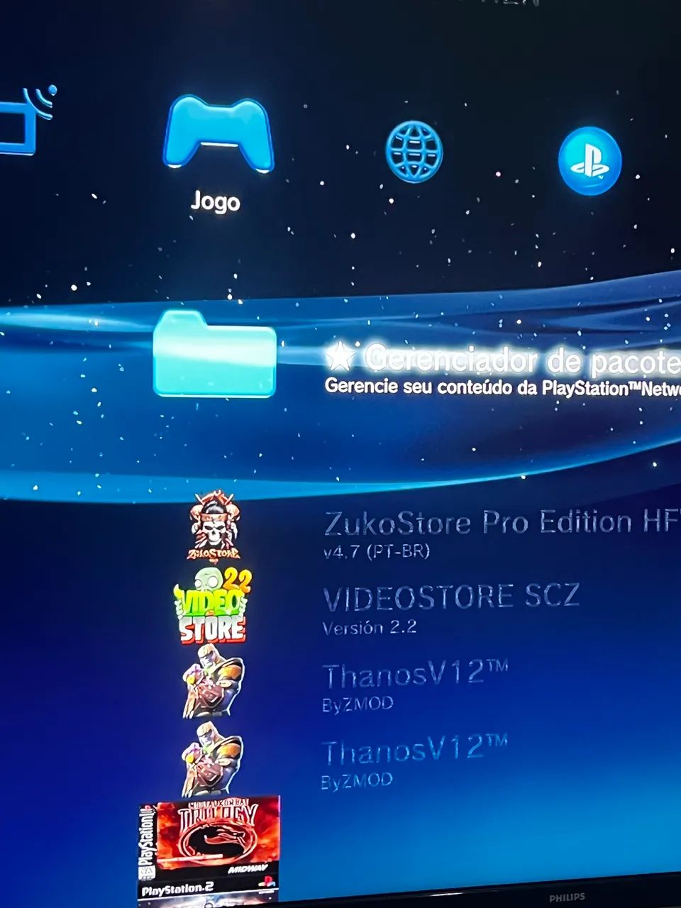 PS3 com 2 controles e lojas instaladas  - Foto 3