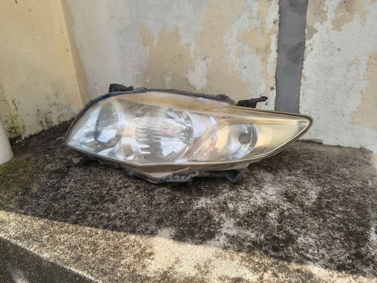 Farol esquerdo Corolla 09/11 original 