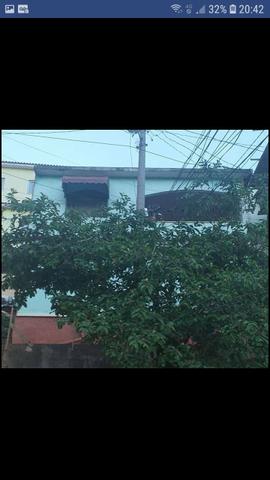 Vendo casa com quitinete junto e um terreno nos fundos 70mil