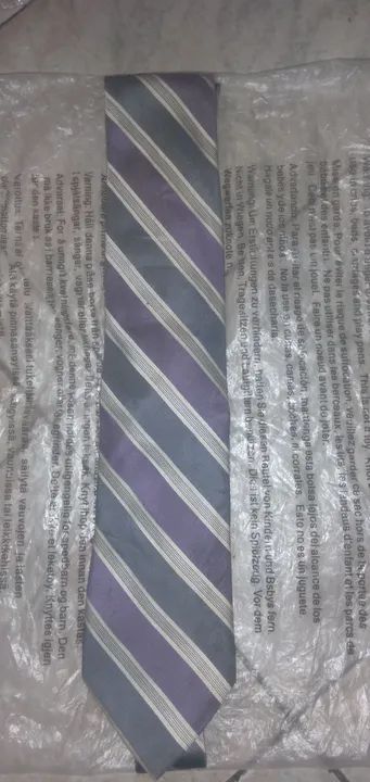 Gravata listrada azul e branca,semi nova, ACEITA TROCA