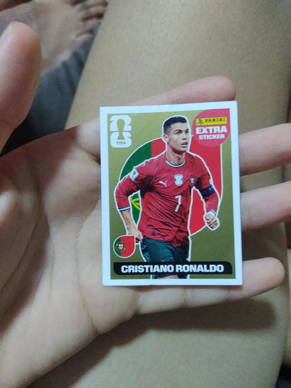 Figurinha legend Cristiano Ronaldo ouro e Vinícius Junior bordo 
