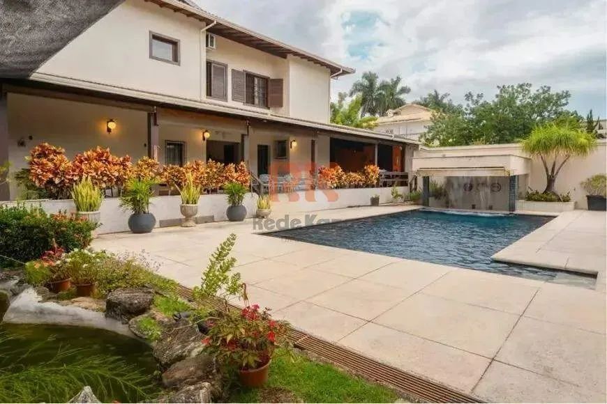 Casa com habite-se à venda no bairro São Luiz | 462m² | 1.000m² | 5 quartos | 2 suítes | P