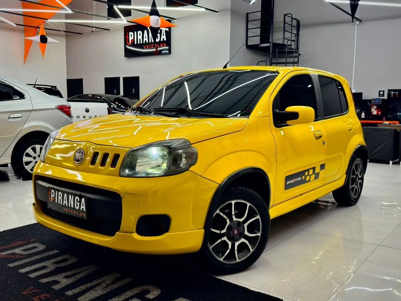 Fiat Uno Sporting 1.4 EVO Fire Flex 8V 4P 2012 - Foto 2