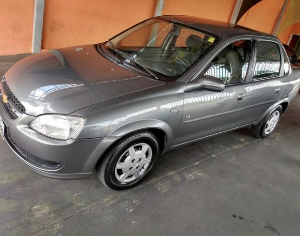 Corsa sedan LS 1.0 - 2012 Completo com Ar