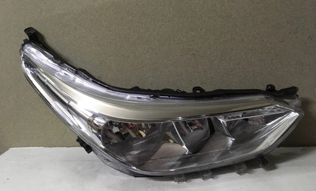 Farol Toyota Yaris (elétrico )