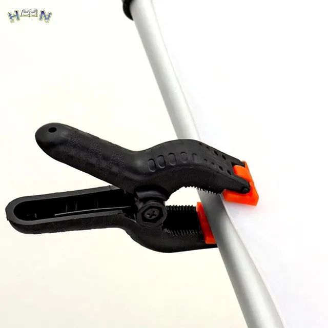 Suporte tipo pregador para Fundo Fotografico