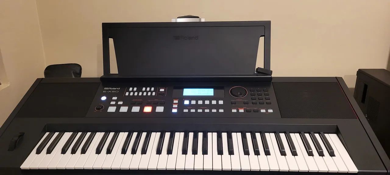 Teclado Roland E-X50 novissimo