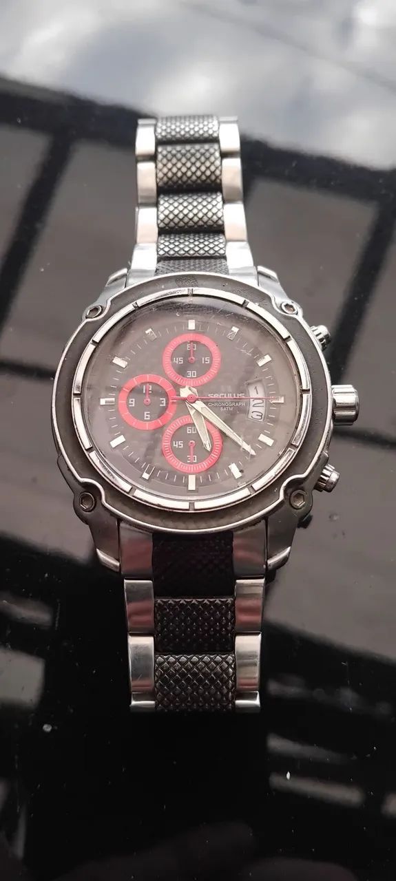 Vendo Relógio SECULUS todo original, caixa, pulseira e vidro.
