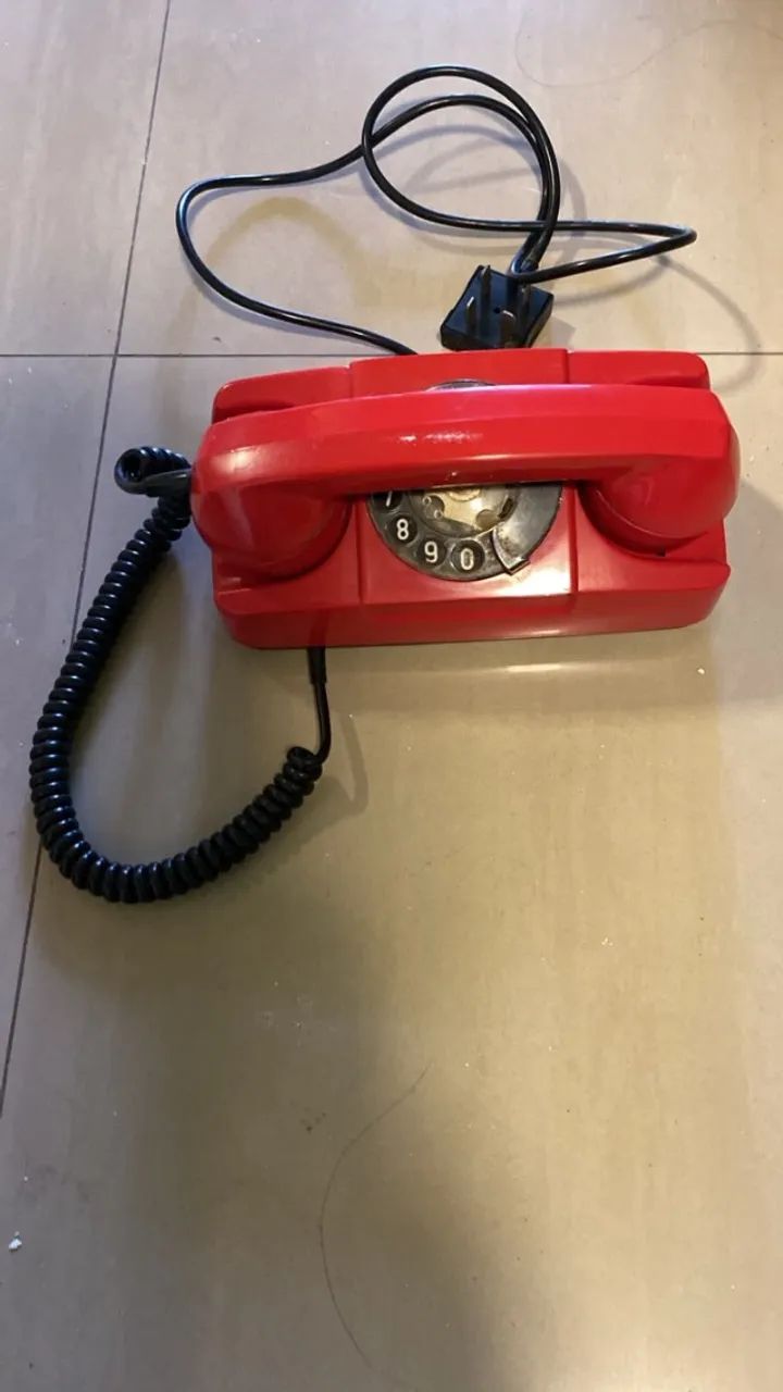 Telefone disco vermelho 