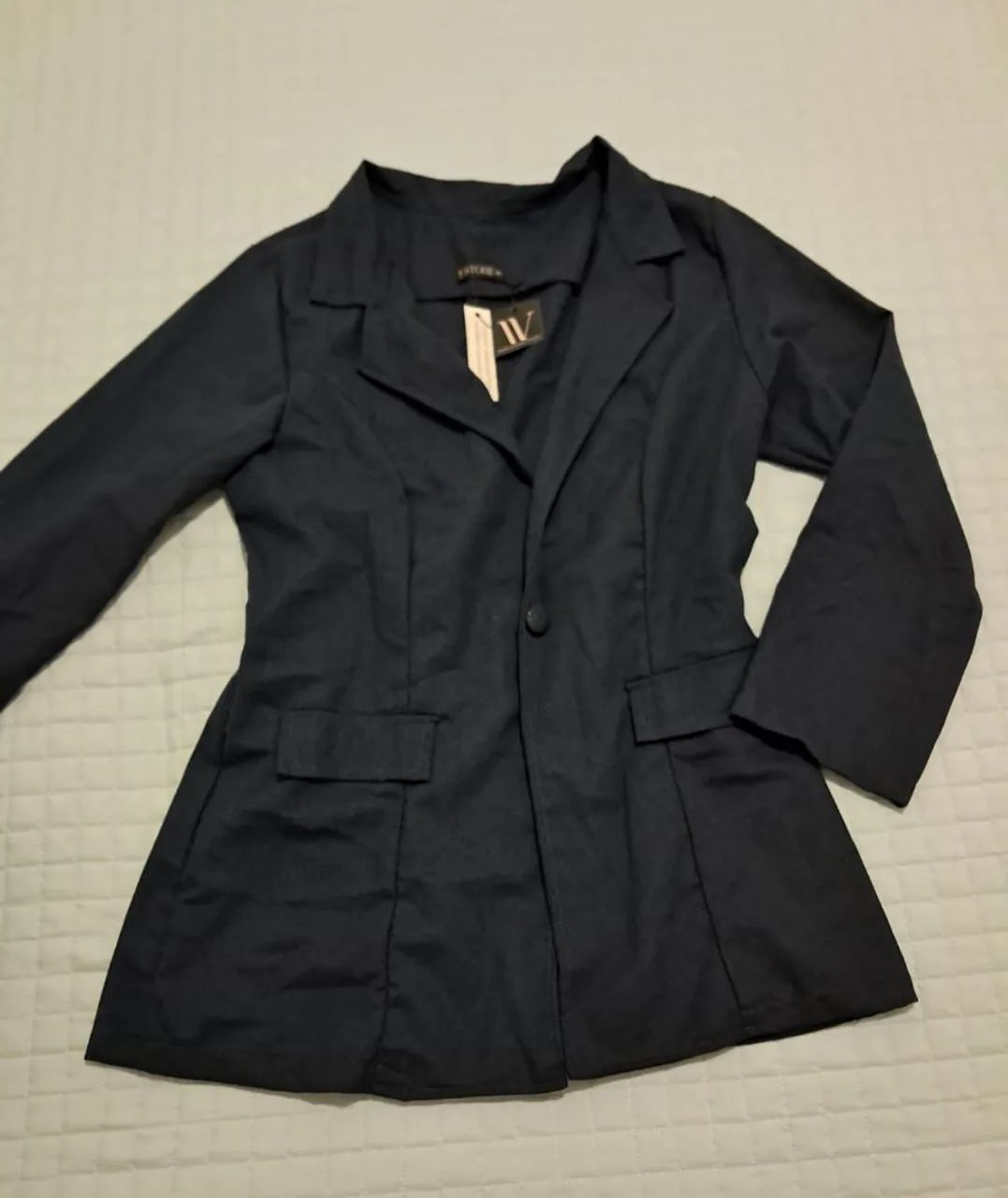 Blusas e casacos novos