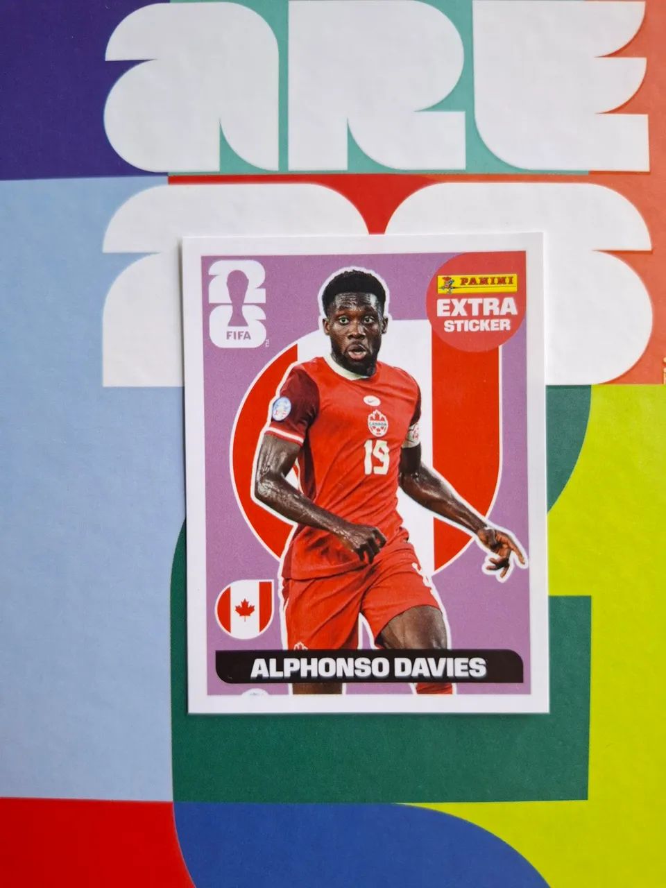 Alphonso Davies roxo 2026 Panini
