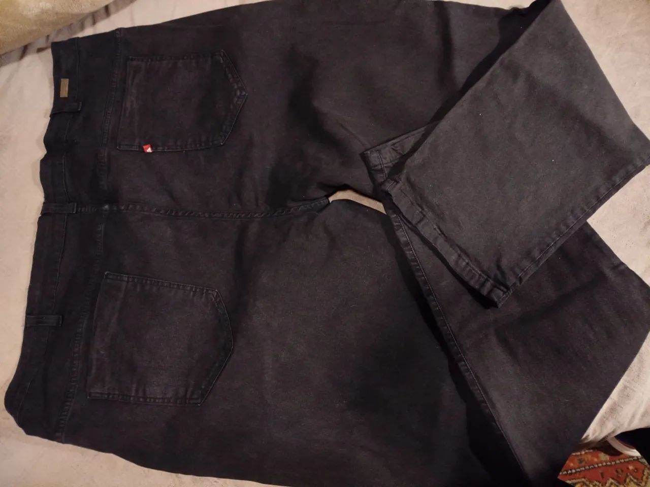 Calça jeans preta plus size 56