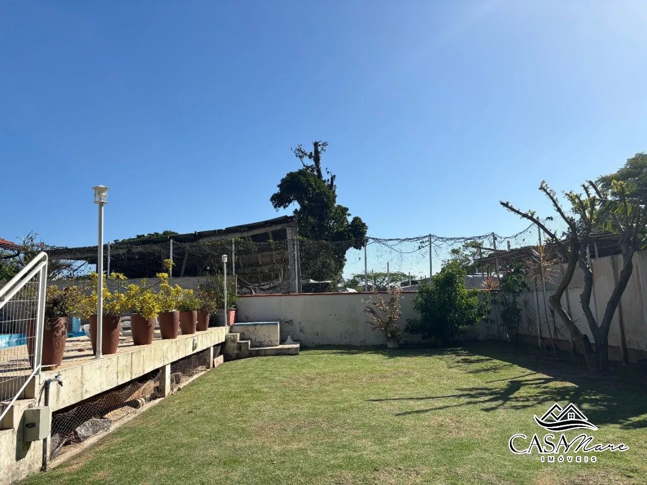 Casa à venda em condomínio no Cacupé - Foto 4