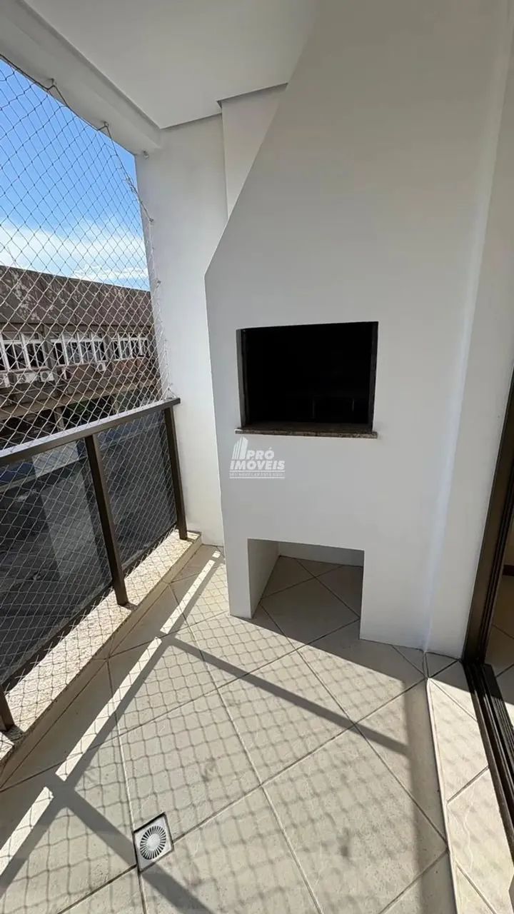 APARTAMENTO NO CENTRO, FRENTE, SACADA E CHURRASQUEIRA - Foto 6