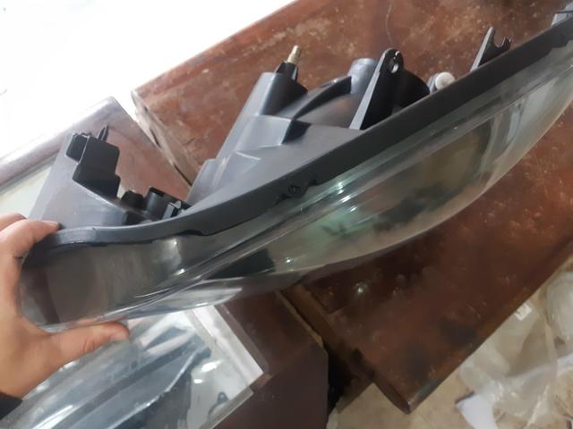 Farol sandero cinza 2012 2015