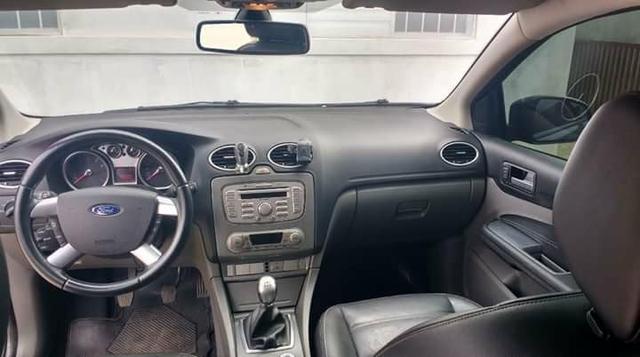 Focus Hatch Titanium 11/12 manual - Foto 3