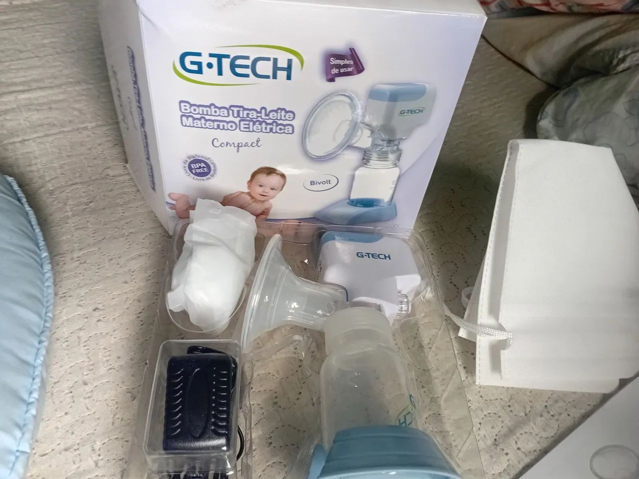 Vendo bomba de tirar leite elétrica nova usada uma vez 