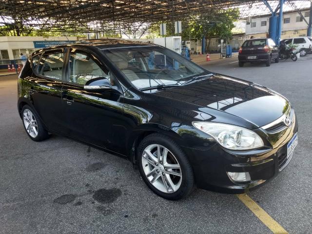 Hyundai i30 2010 automático top com teto - Foto 9