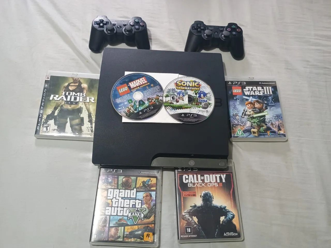 PS3 + 2 CONTROLES + HD 1TB + 6 JOGOS