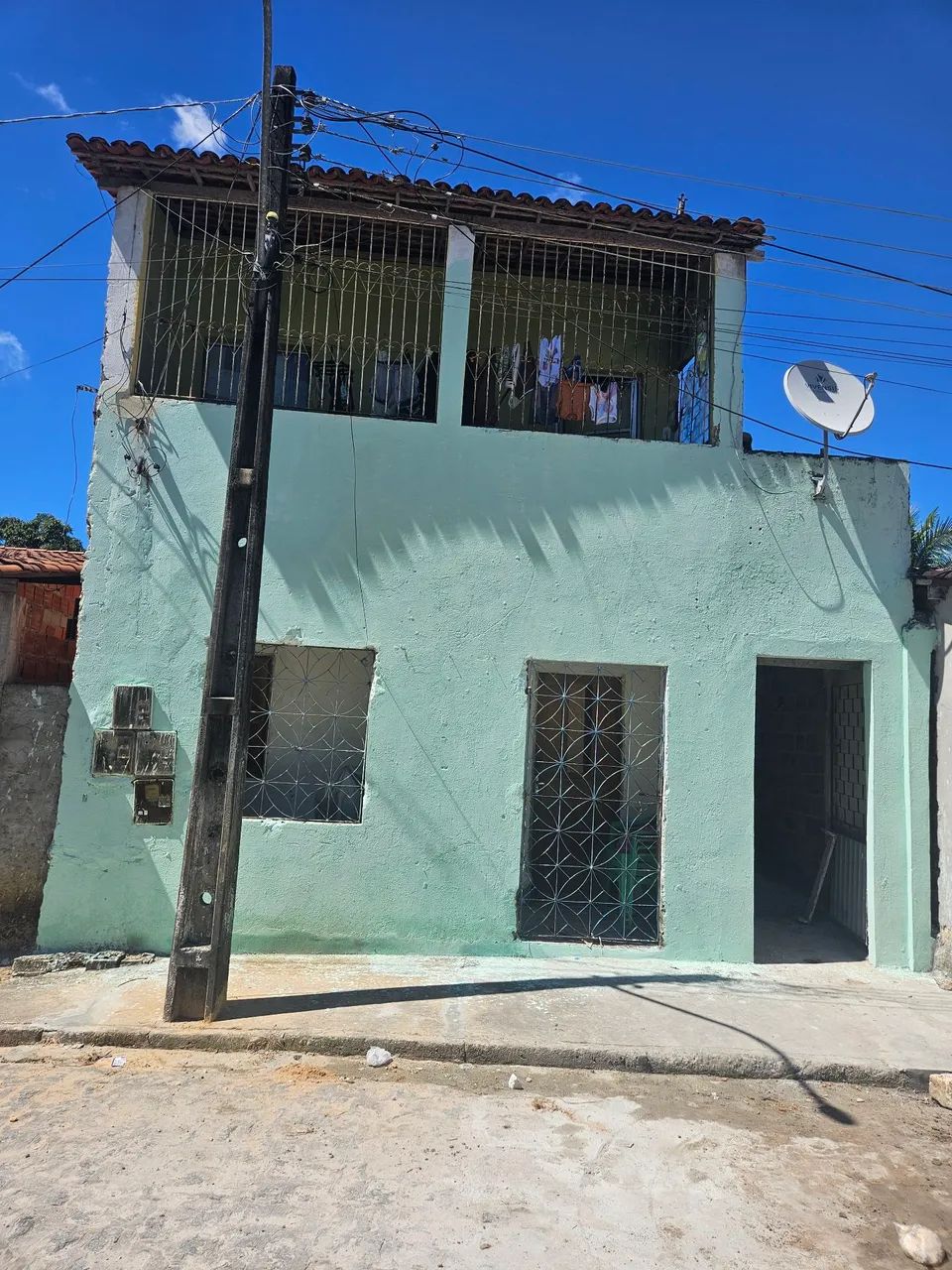 Terreno com 3 casas